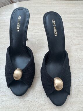 Steve Madden Black Mules with Gold Accent Oval Detail